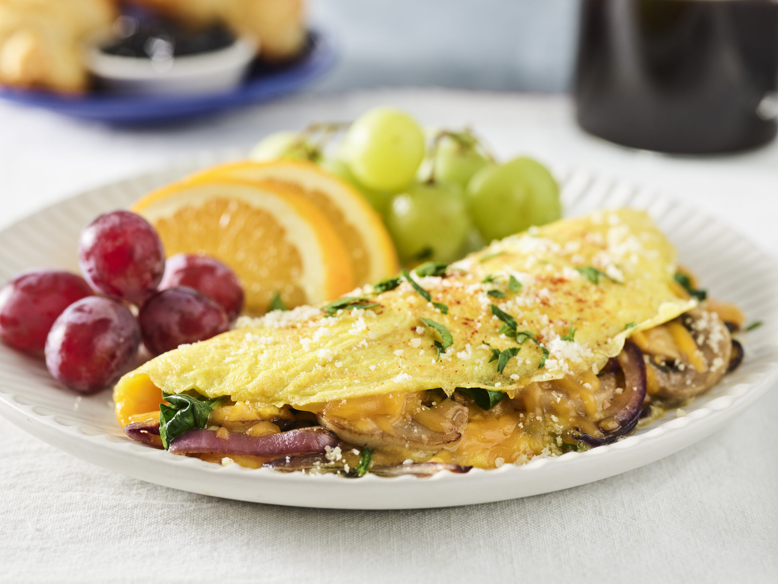 Easy Cheesy Stuffed Veggie Omelette - BordenÂ® Cheese
